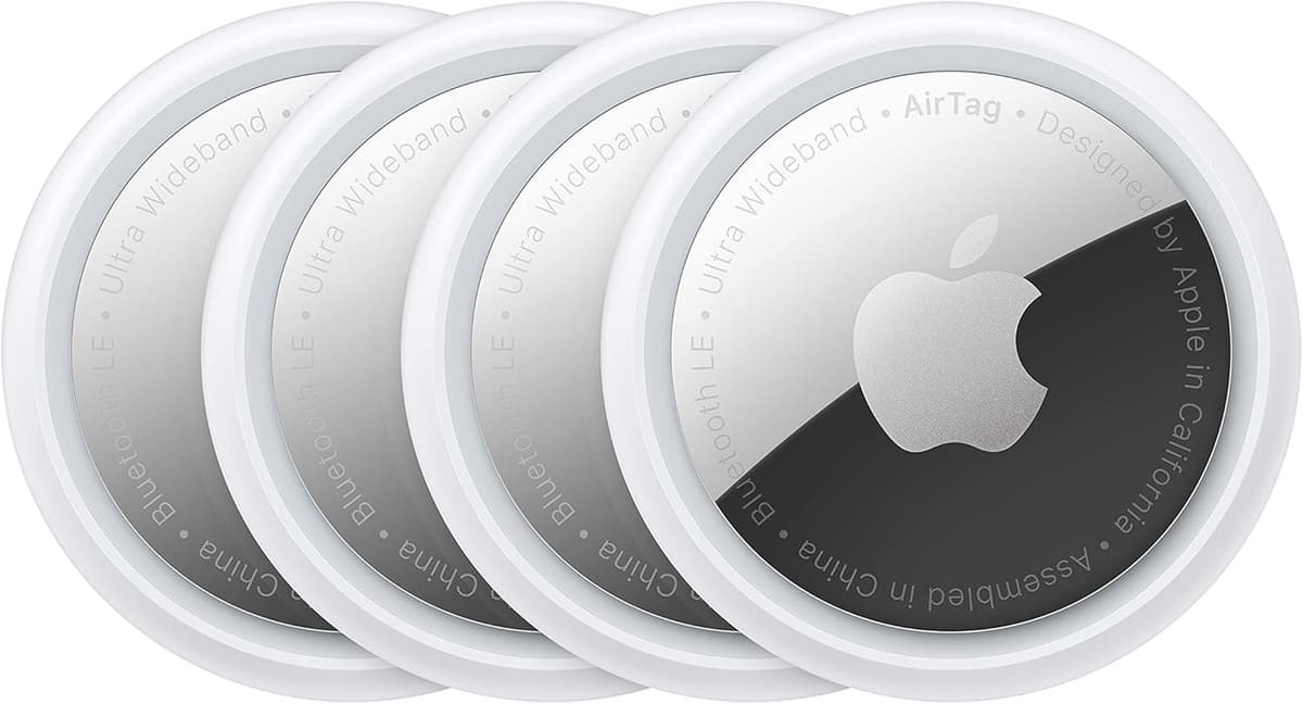 Four Apple AirTags in white